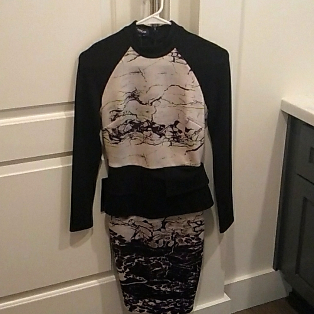Bebe long sleeve printed scuba peplum dress